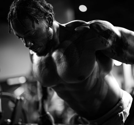 Muscular man exercising in gym, showcasing strength and focus. — Why You Need To Feed You Baby Purified Water?